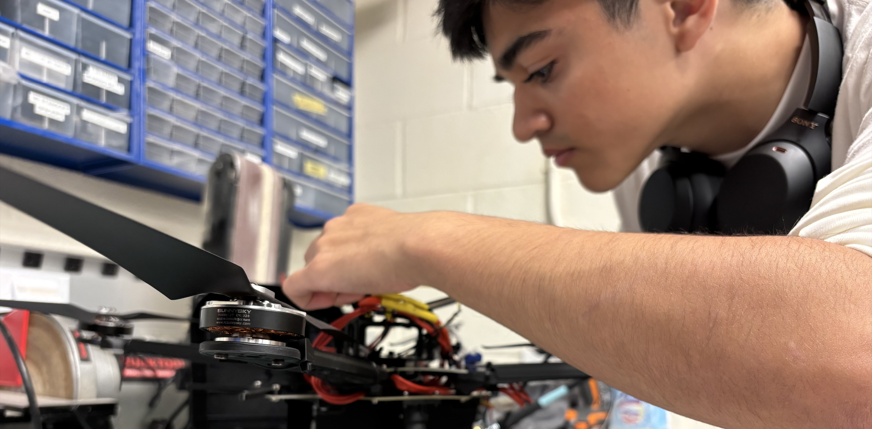 Team member working on electronics